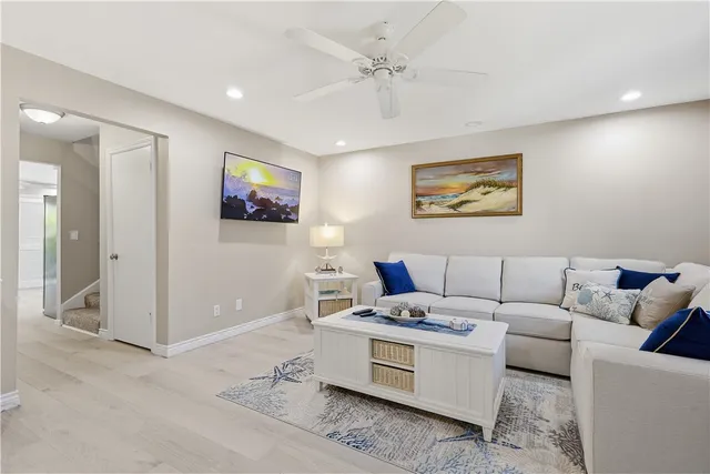a living room with furniture and window