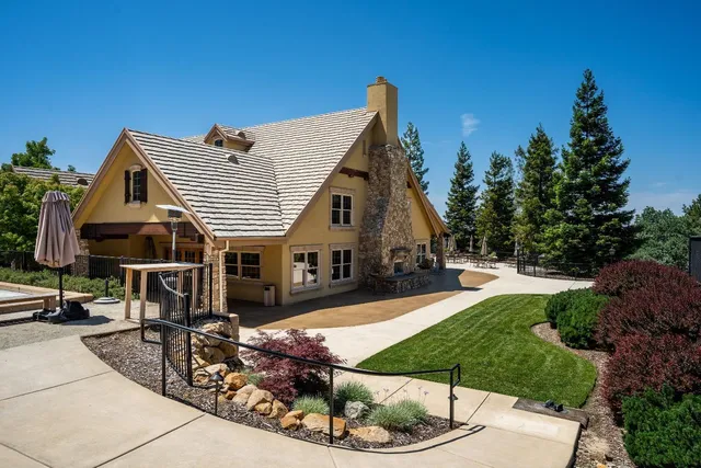 a view of a swimming pool with a patio