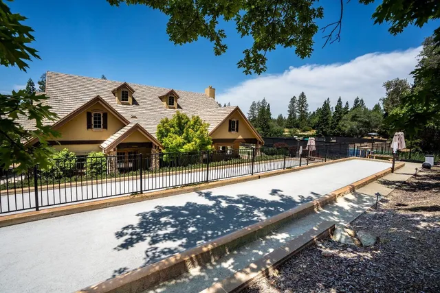 a view of a dining hall with lots of tables and chairs