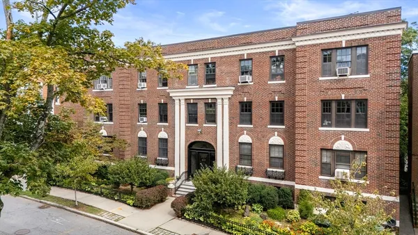 a front view of a multi story residential apartment building