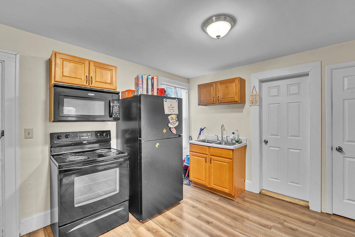 1427 Erie Street Racine, WI 53402 - Photo 15 of 19 Right Side Kitchen