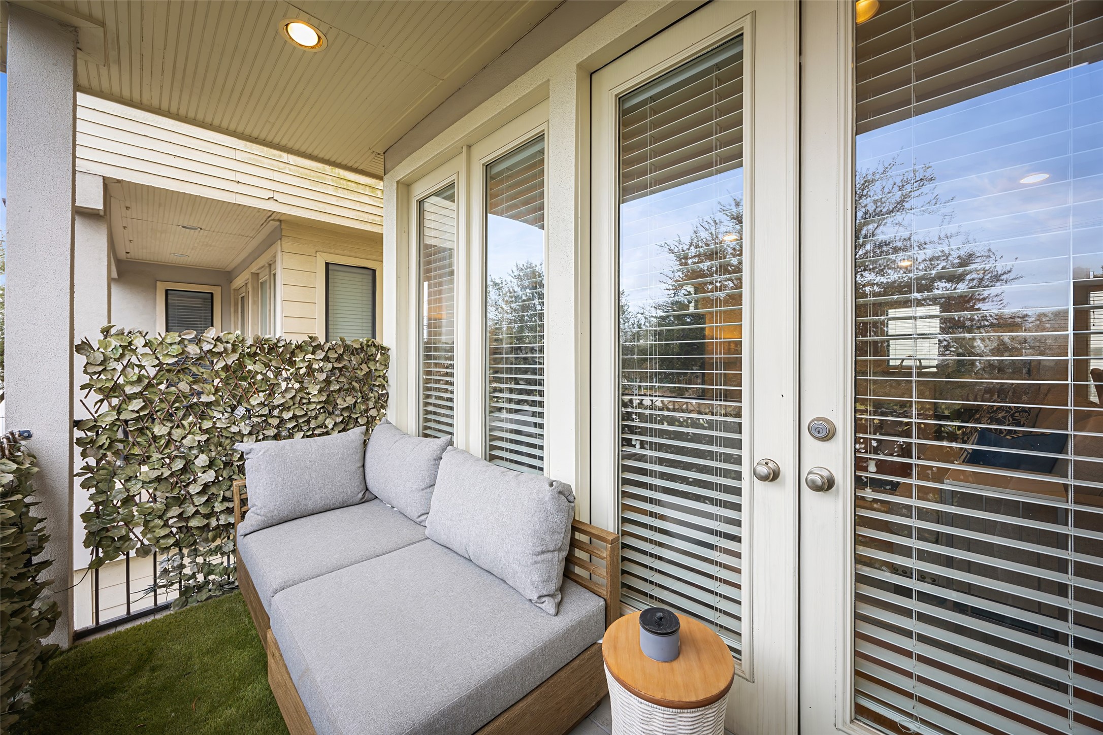 2320 Emancipation Avenue Houston, TX 77004 - Photo 13 of 38 a view of a porch with furniture and floor to ceiling window