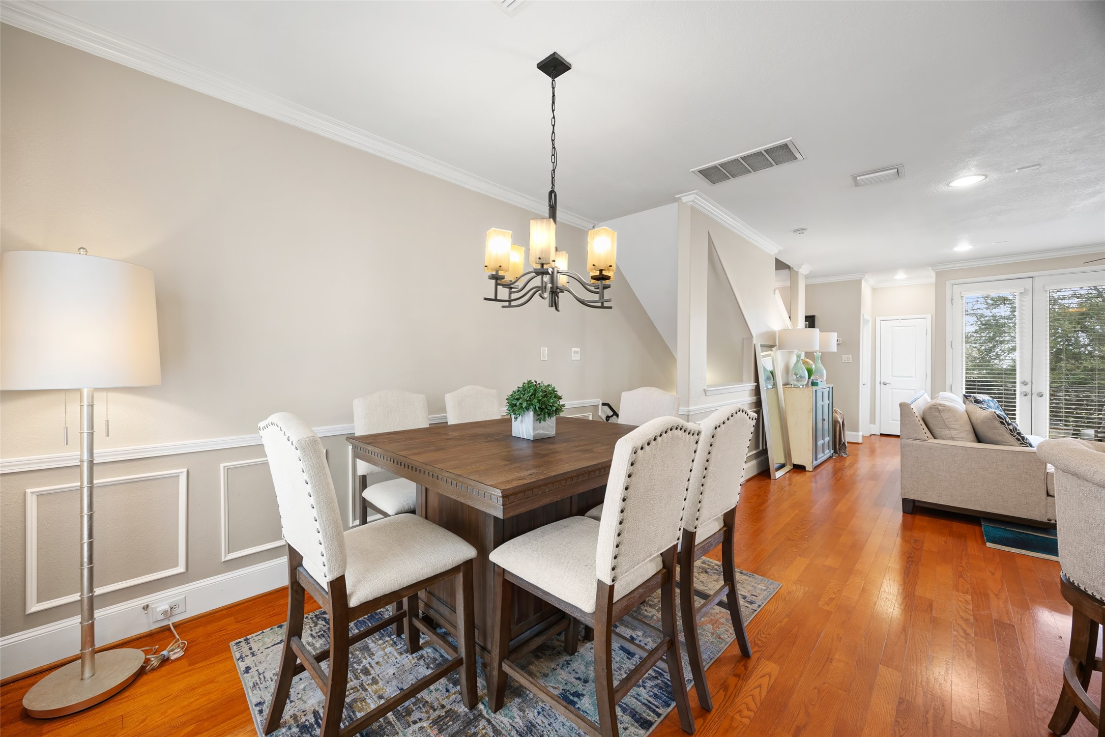 2320 Emancipation Avenue Houston, TX 77004 - Photo 17 of 38 a view of a dining room with furniture and wooden floor