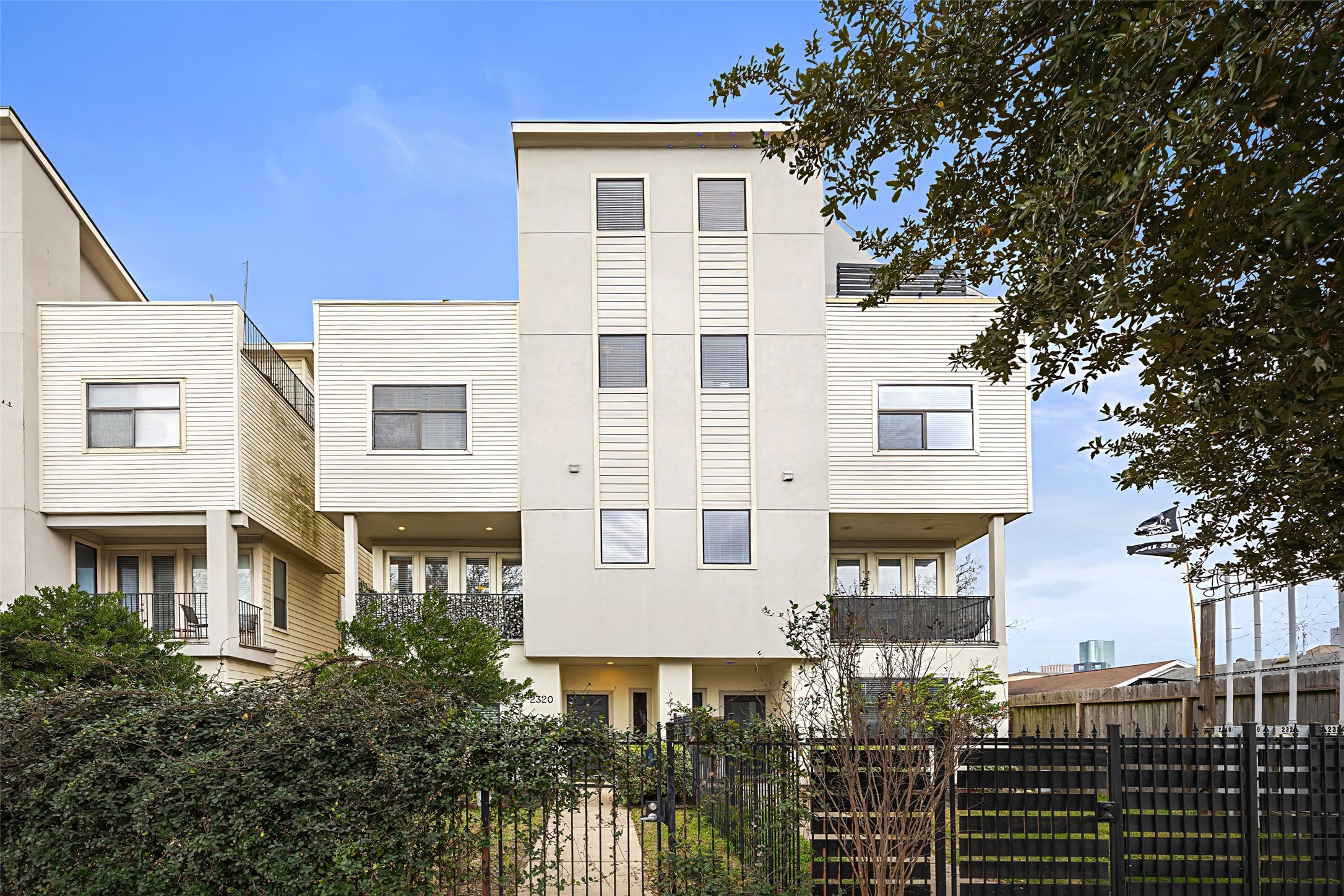 2320 Emancipation Avenue Houston, TX 77004 - Photo 2 of 38 a view of a white building among the street