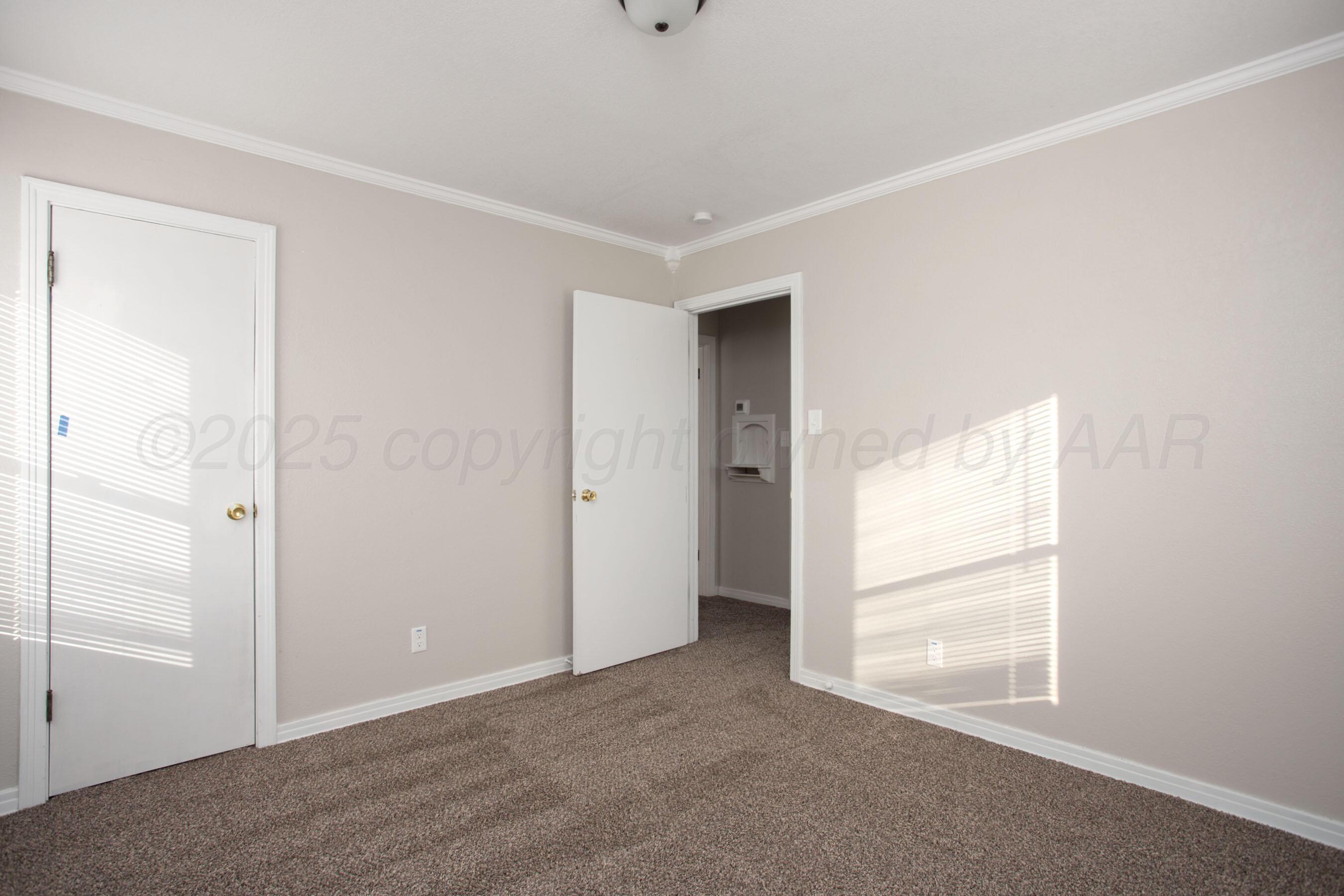 1928 Cherry Street Amarillo, TX 79106 - Photo 13 of 24 a view of an empty room with a window