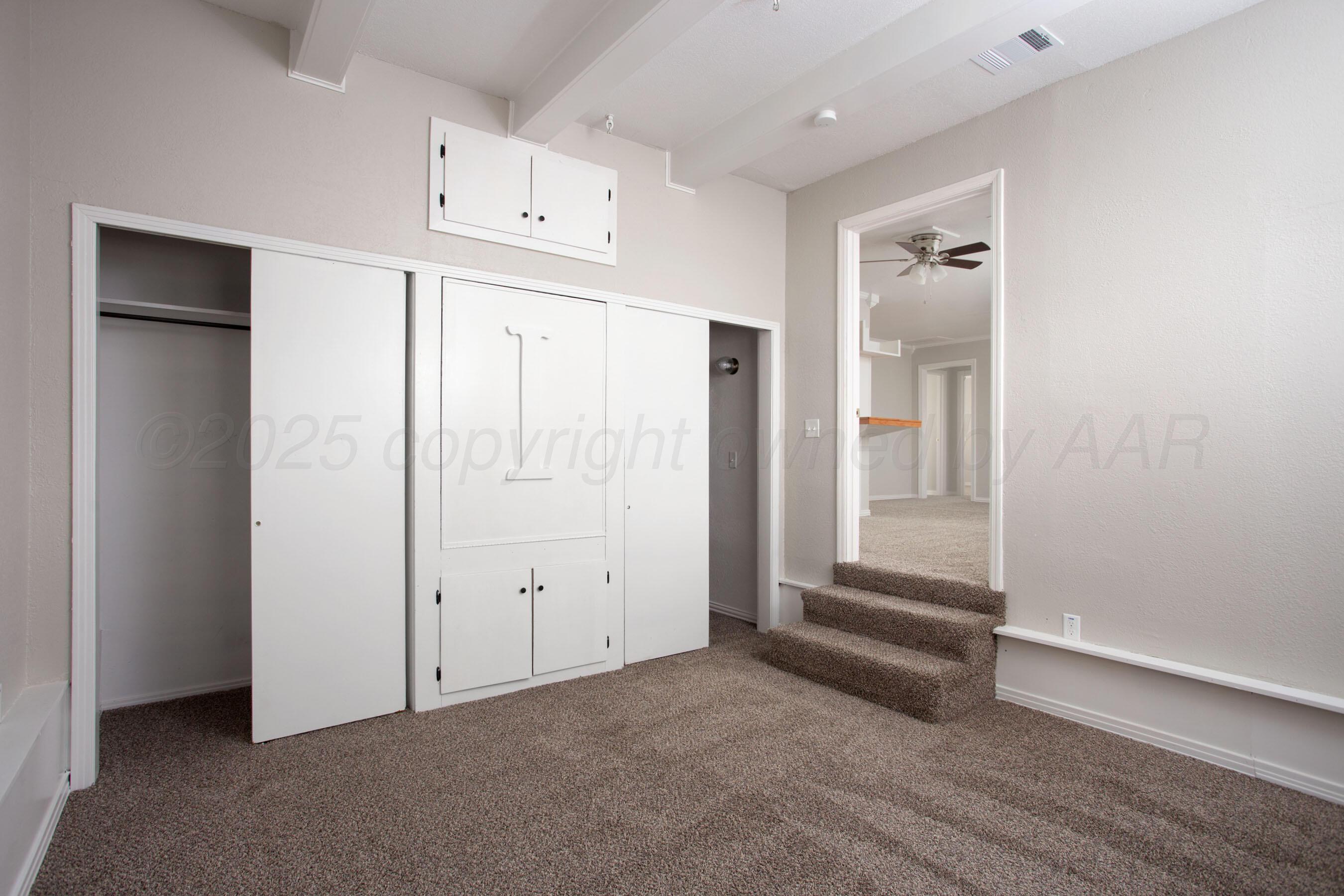 1928 Cherry Street Amarillo, TX 79106 - Photo 17 of 24 an empty room with window