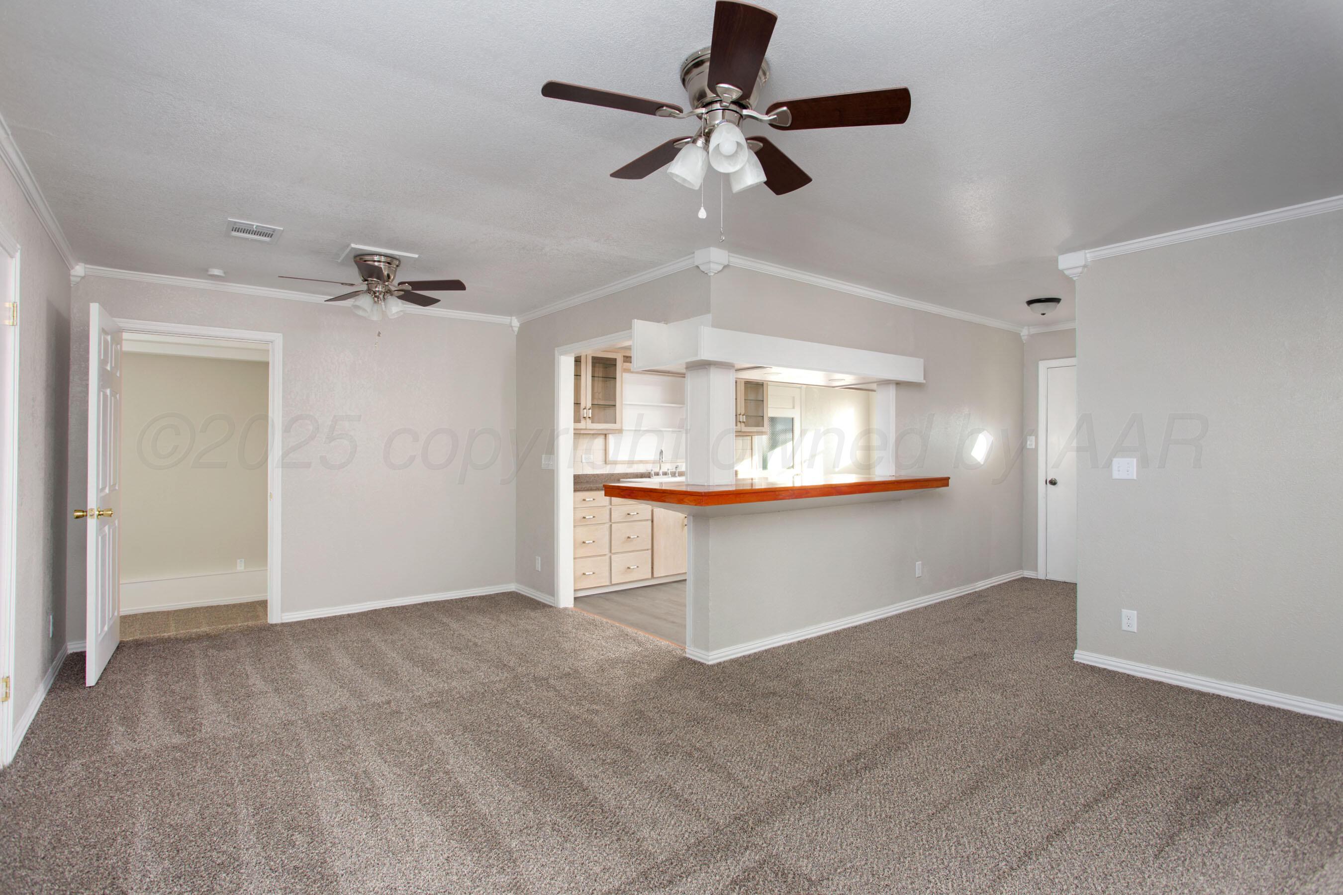 1928 Cherry Street Amarillo, TX 79106 - Photo 8 of 24 a view of an empty room with a window