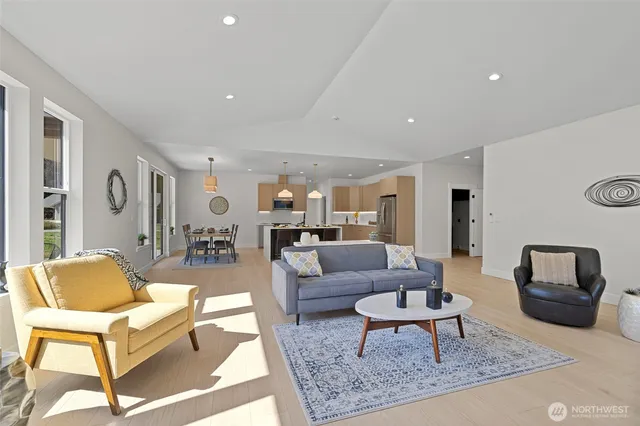 a living room with furniture and a rug