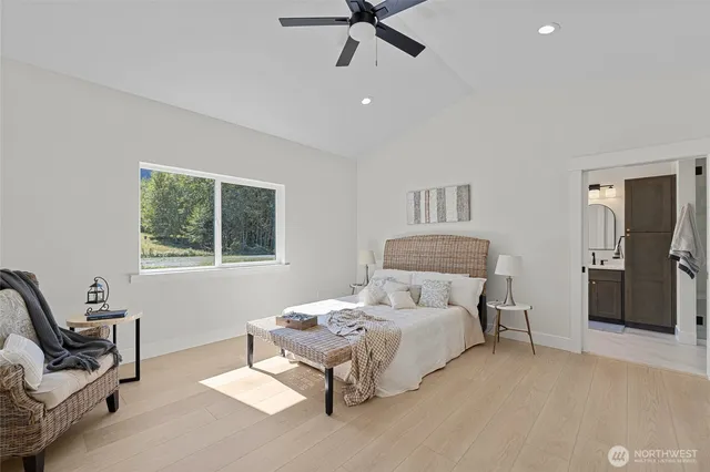 a bedroom with a bed and furniture