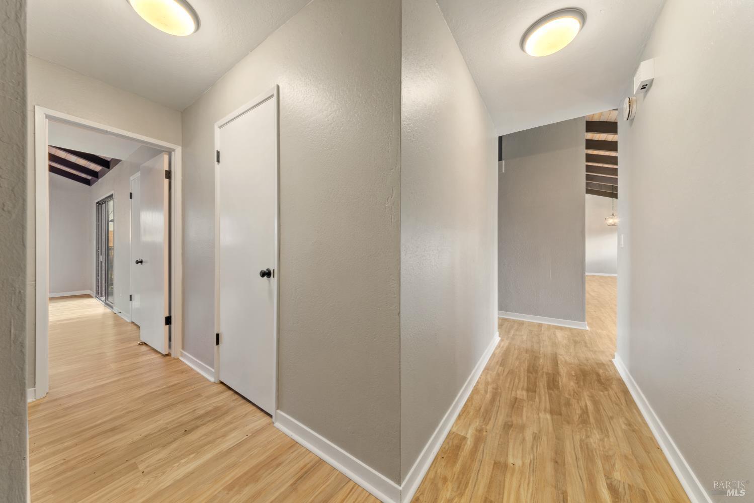 5 Mc Donald Lane Point Reyes Station, CA 94956 - Photo 19 of 48 a view of hallway with wooden floor