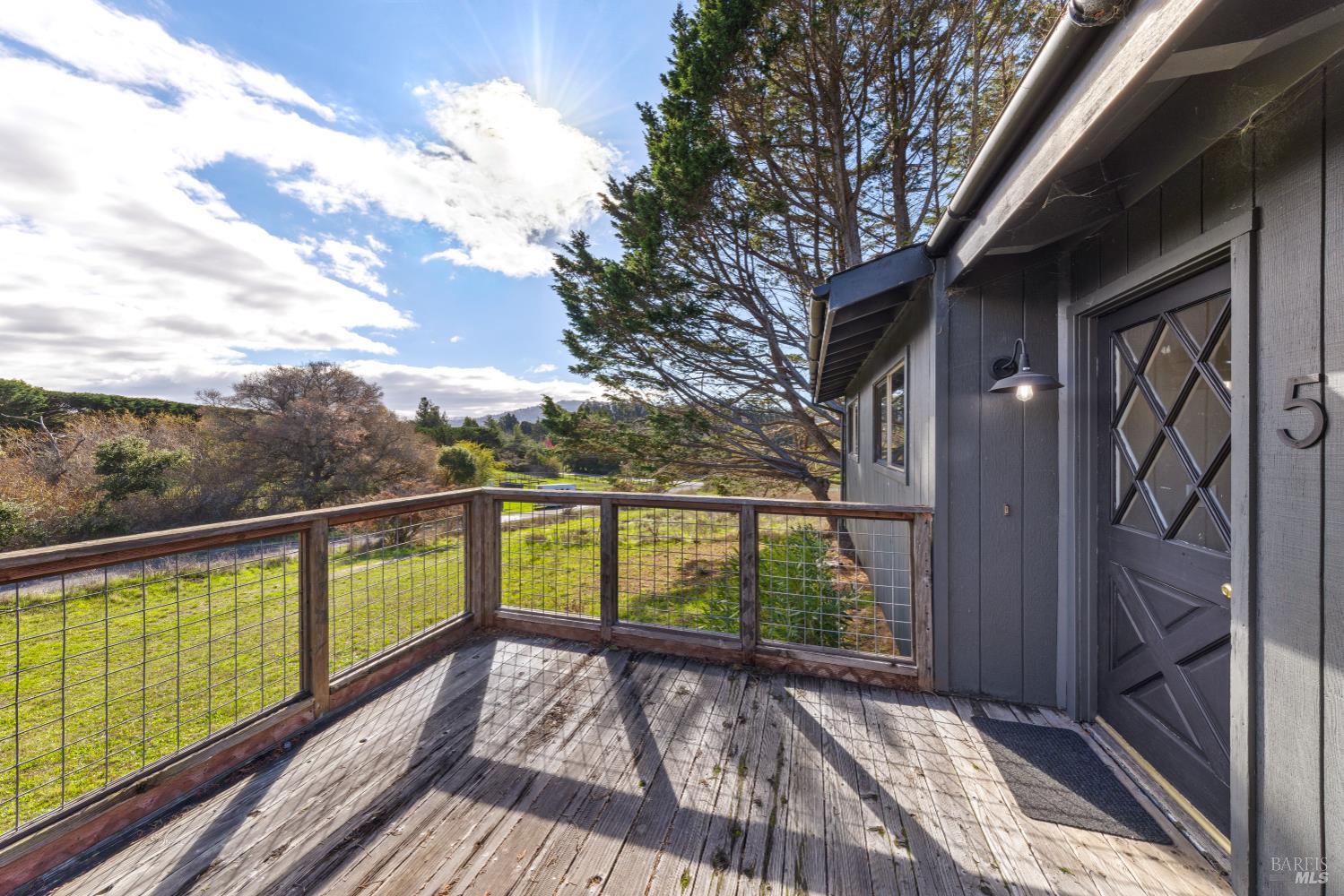 5 Mc Donald Lane Point Reyes Station, CA 94956 - Photo 2 of 48 a view of a balcony with wooden floor