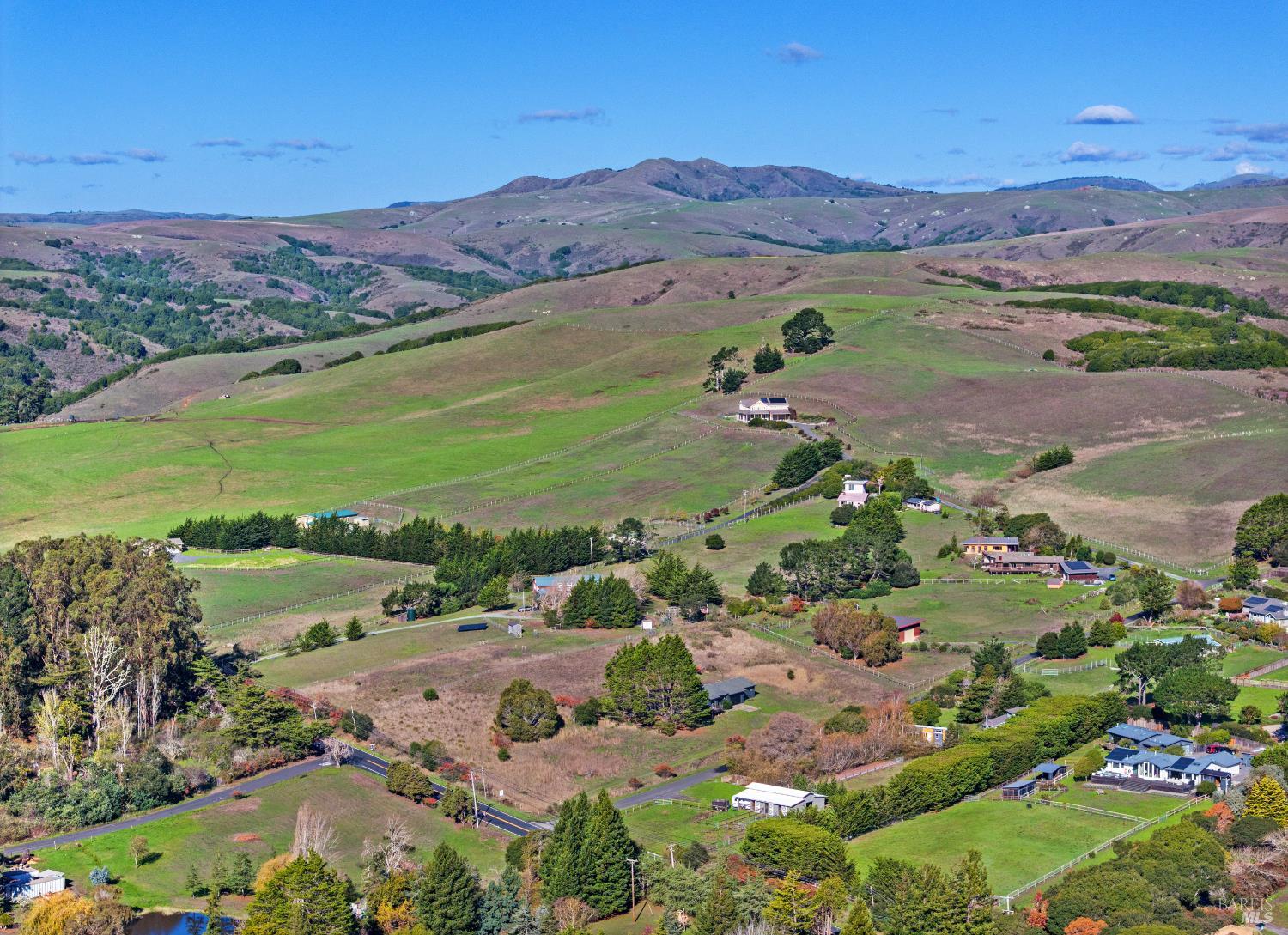 5 Mc Donald Lane Point Reyes Station, CA 94956 - Photo 42 of 48 a view of a city with mountains in the background