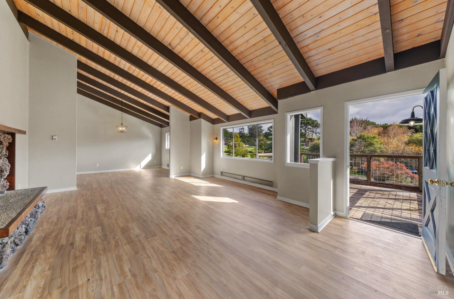 5 Mc Donald Lane Point Reyes Station, CA 94956 - Photo 5 of 48 a view of interior space with wooden floor and windows