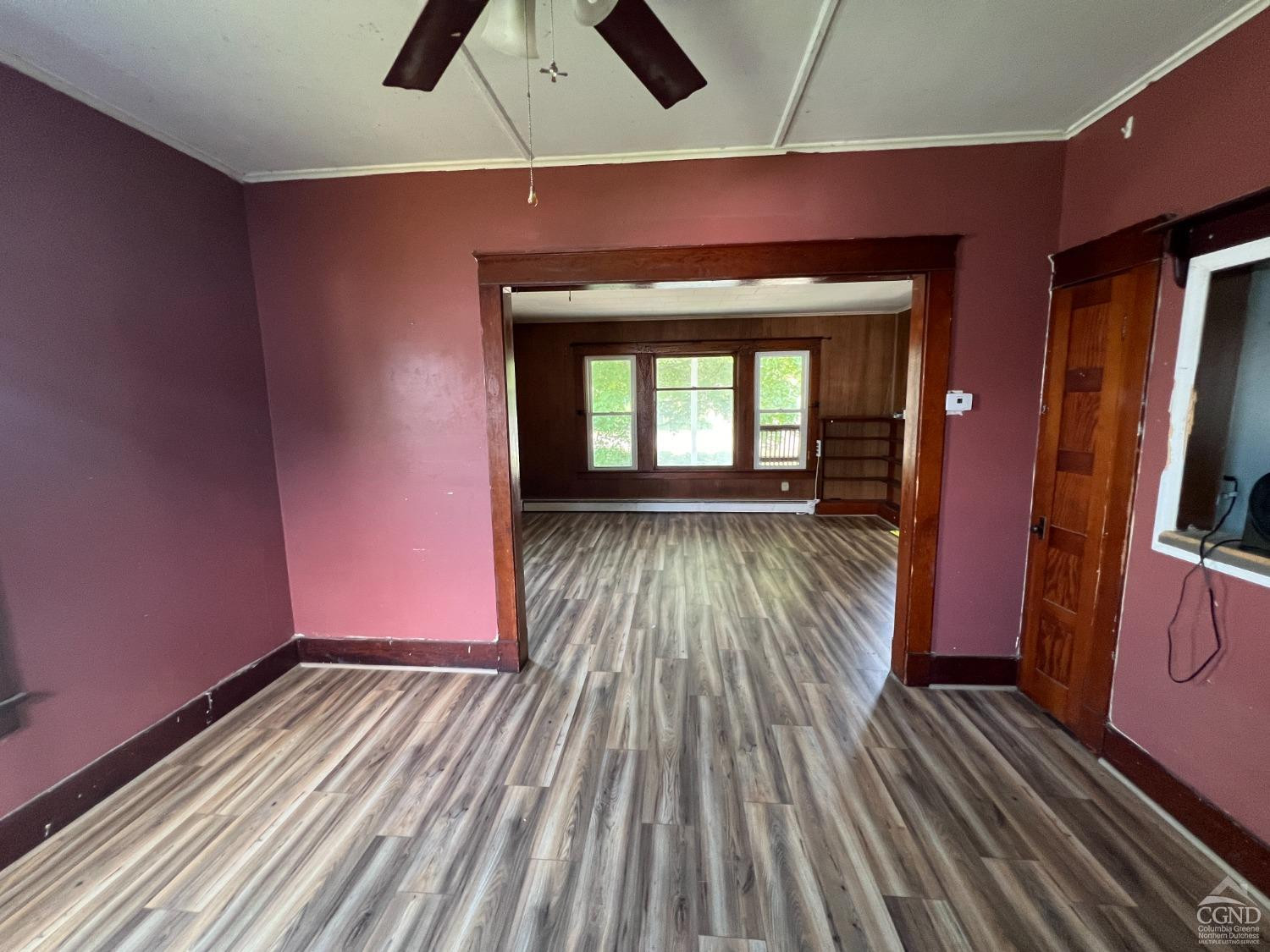 163 Spring Street Catskill, NY 12414 - Photo 13 of 36 a view of a room with wooden floor and window