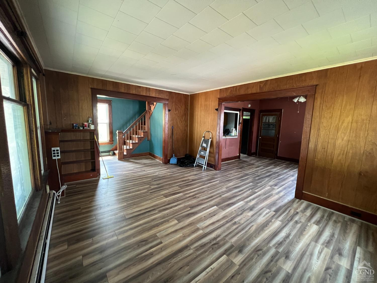 163 Spring Street Catskill, NY 12414 - Photo 18 of 36 a view of a hallway with wooden floor and closet