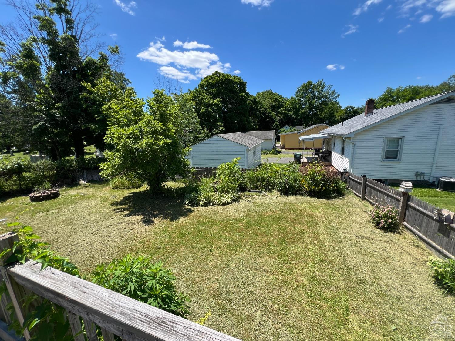 163 Spring Street Catskill, NY 12414 - Photo 34 of 36 a backyard of a house with table and chairs