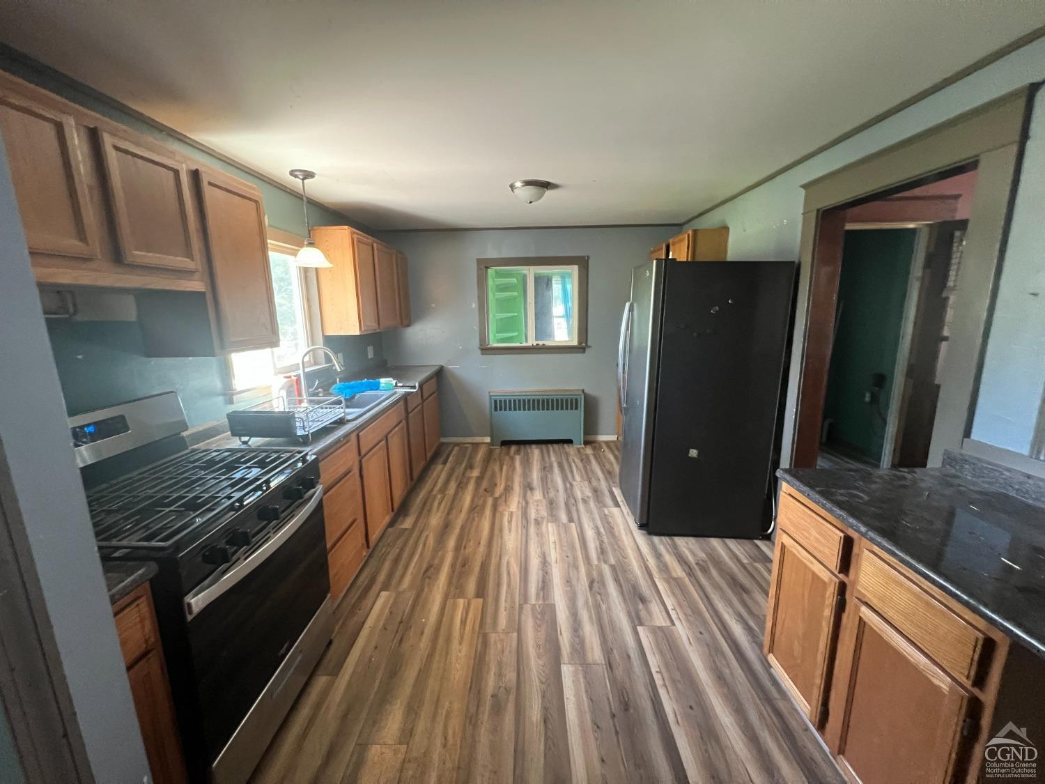 163 Spring Street Catskill, NY 12414 - Photo 4 of 36 a kitchen with granite countertop lots of counter top space and stainless steel appliances