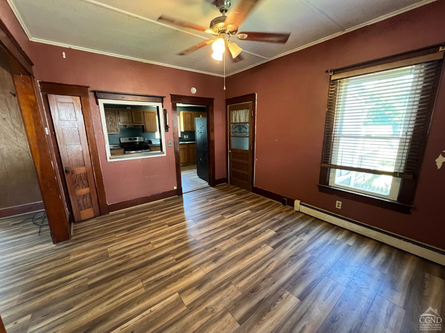 163 Spring Street Catskill, NY 12414 - Photo 10 of 36 a view of a livingroom with a ceiling fan and window