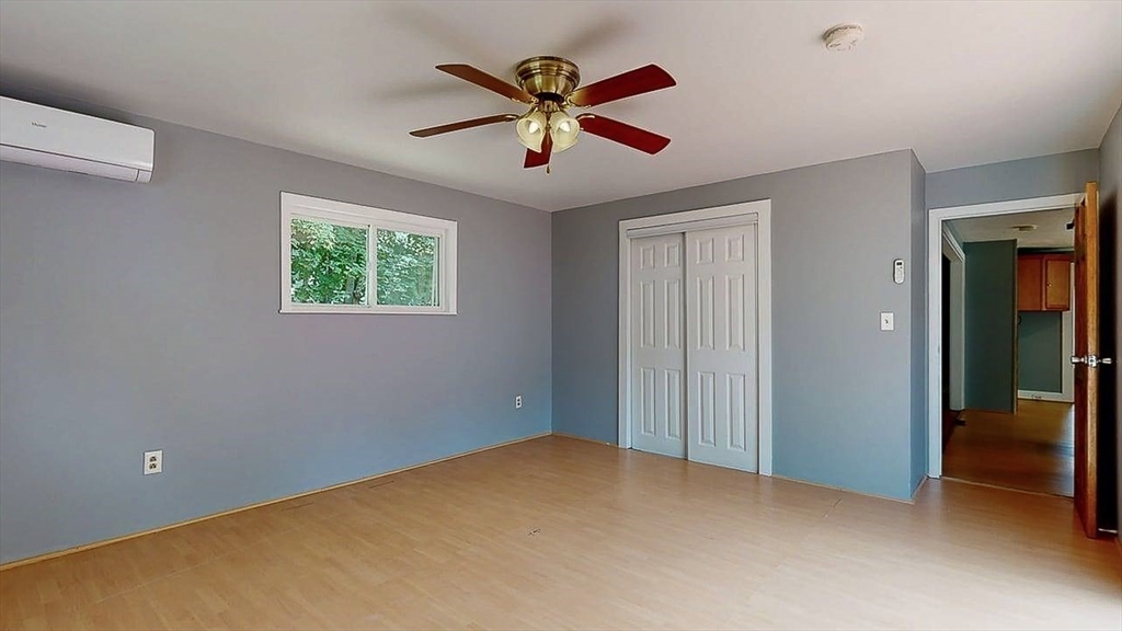 10 Overlook Avenue Charlton, MA 01507 - Photo 17 of 40 a view of an empty room with window and closet area