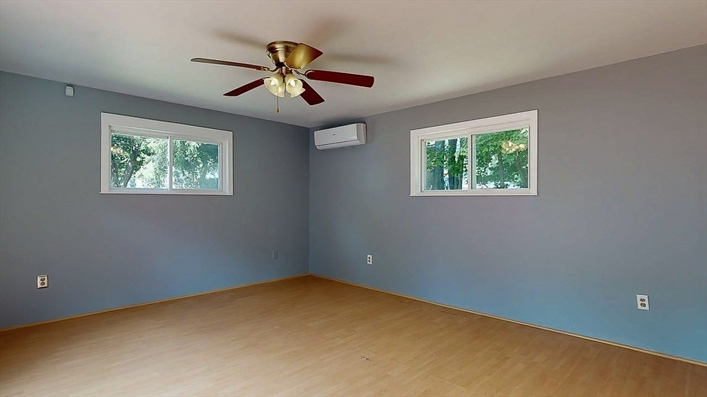 10 Overlook Avenue Charlton, MA 01507 - Photo 18 of 40 a view of room with window and ceiling fan