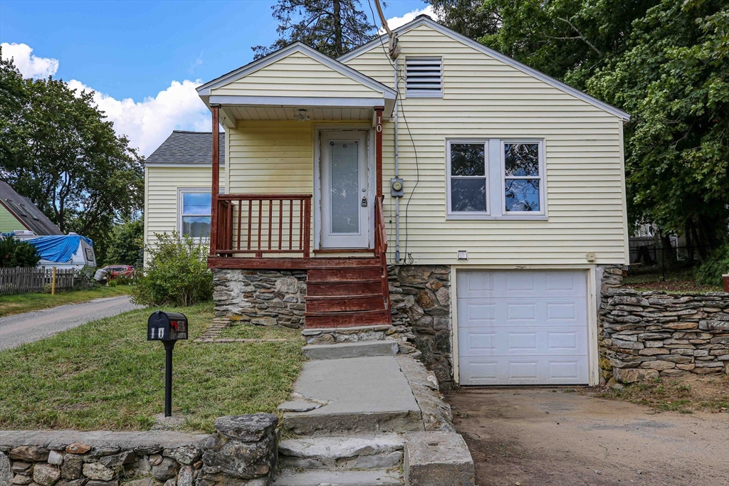 10 Overlook Avenue Charlton, MA 01507 - Photo 28 of 40 a front view of a house with a yard and garage