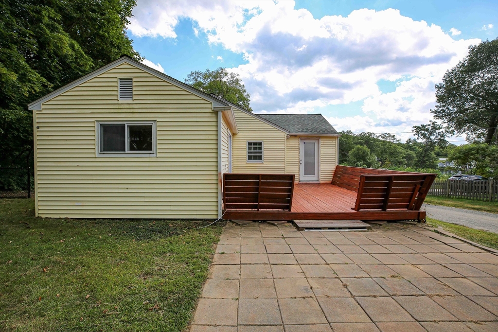 10 Overlook Avenue Charlton, MA 01507 - Photo 31 of 40 a view of a chairs setting in the back yard
