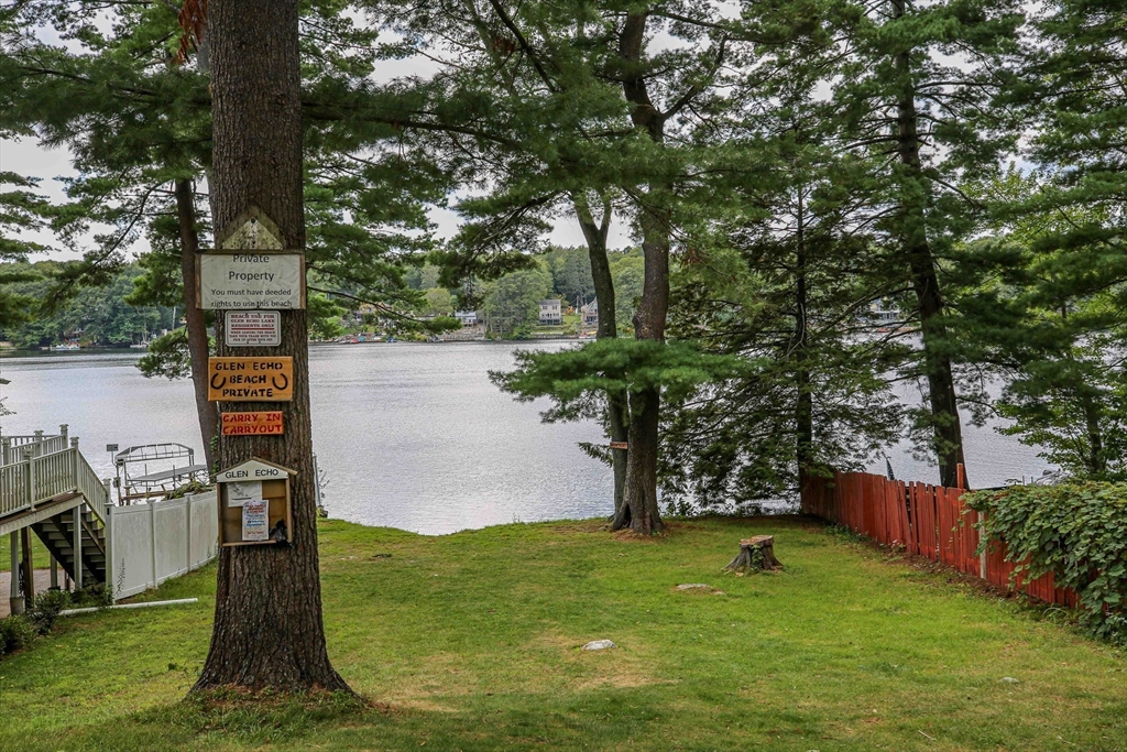 10 Overlook Avenue Charlton, MA 01507 - Photo 37 of 40 a view of a street with a bench and trees in the background