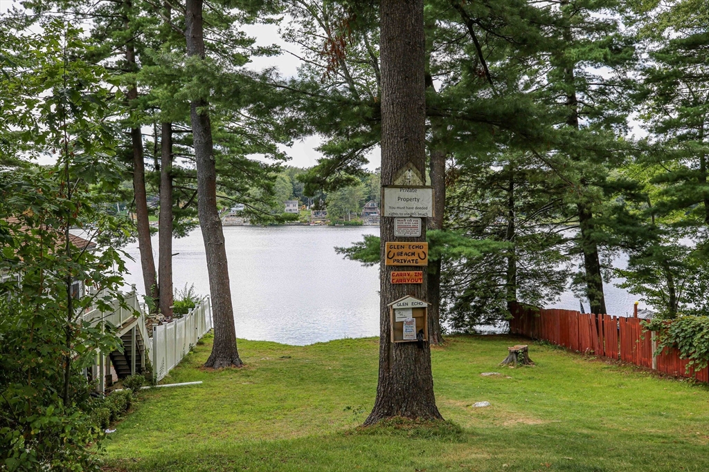 10 Overlook Avenue Charlton, MA 01507 - Photo 39 of 40 a backyard of a house with lots of plants and tree
