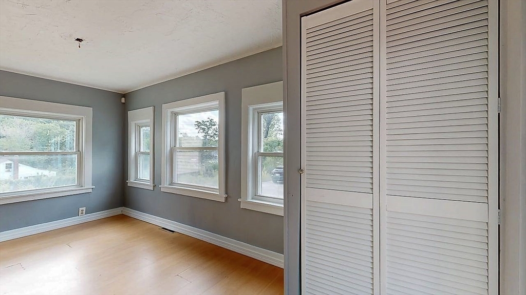 10 Overlook Avenue Charlton, MA 01507 - Photo 8 of 40 a view of an empty room with a window