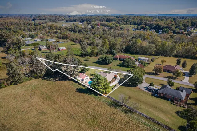 an aerial view of houses with outdoor space