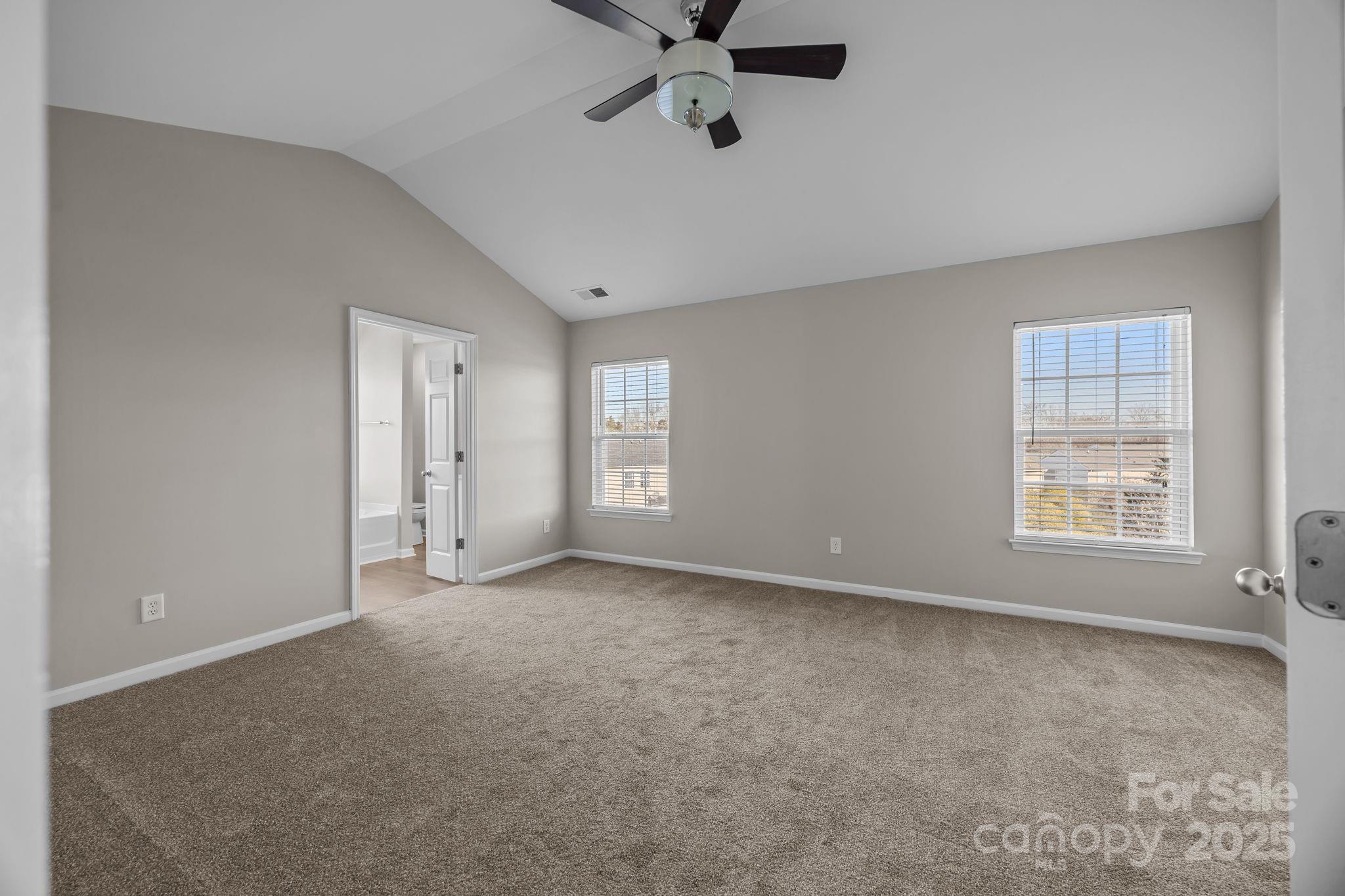 3422 Burnage Hall Road Harrisburg, NC 28075 - Photo 24 of 42 a view of an empty room with a window