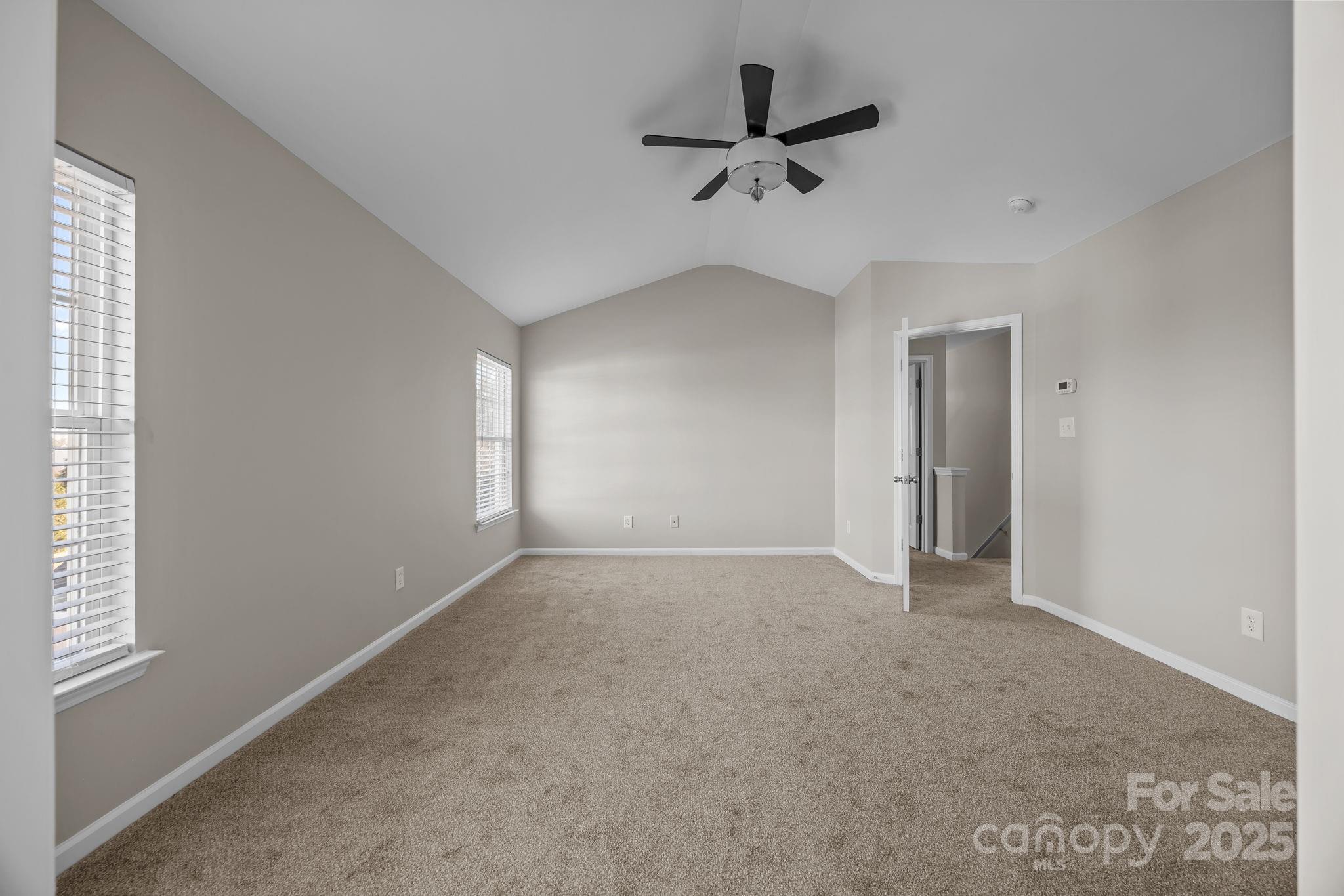 3422 Burnage Hall Road Harrisburg, NC 28075 - Photo 25 of 42 a view of an empty room with a window