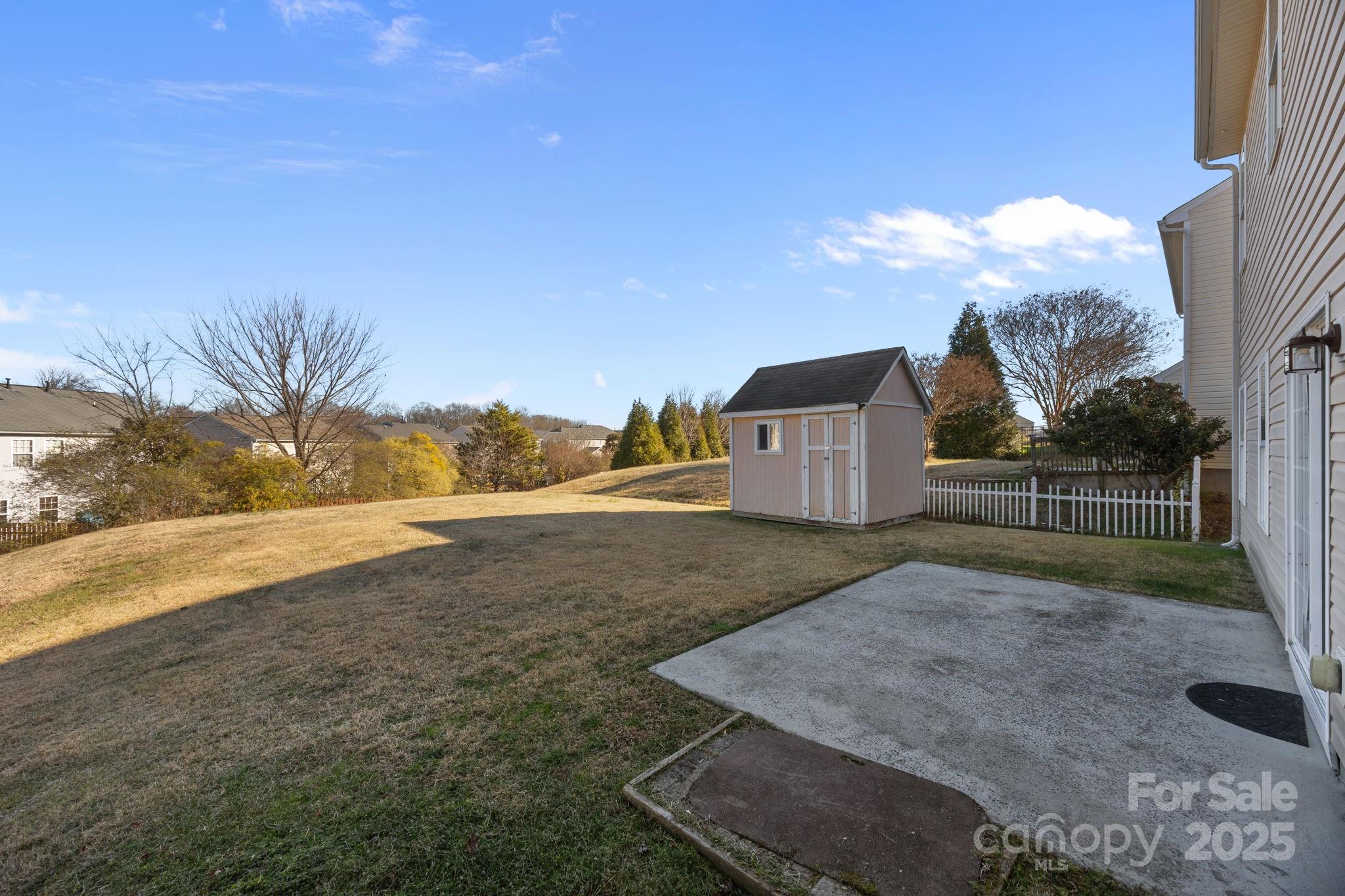 3422 Burnage Hall Road Harrisburg, NC 28075 - Photo 36 of 42 a view of a backyard
