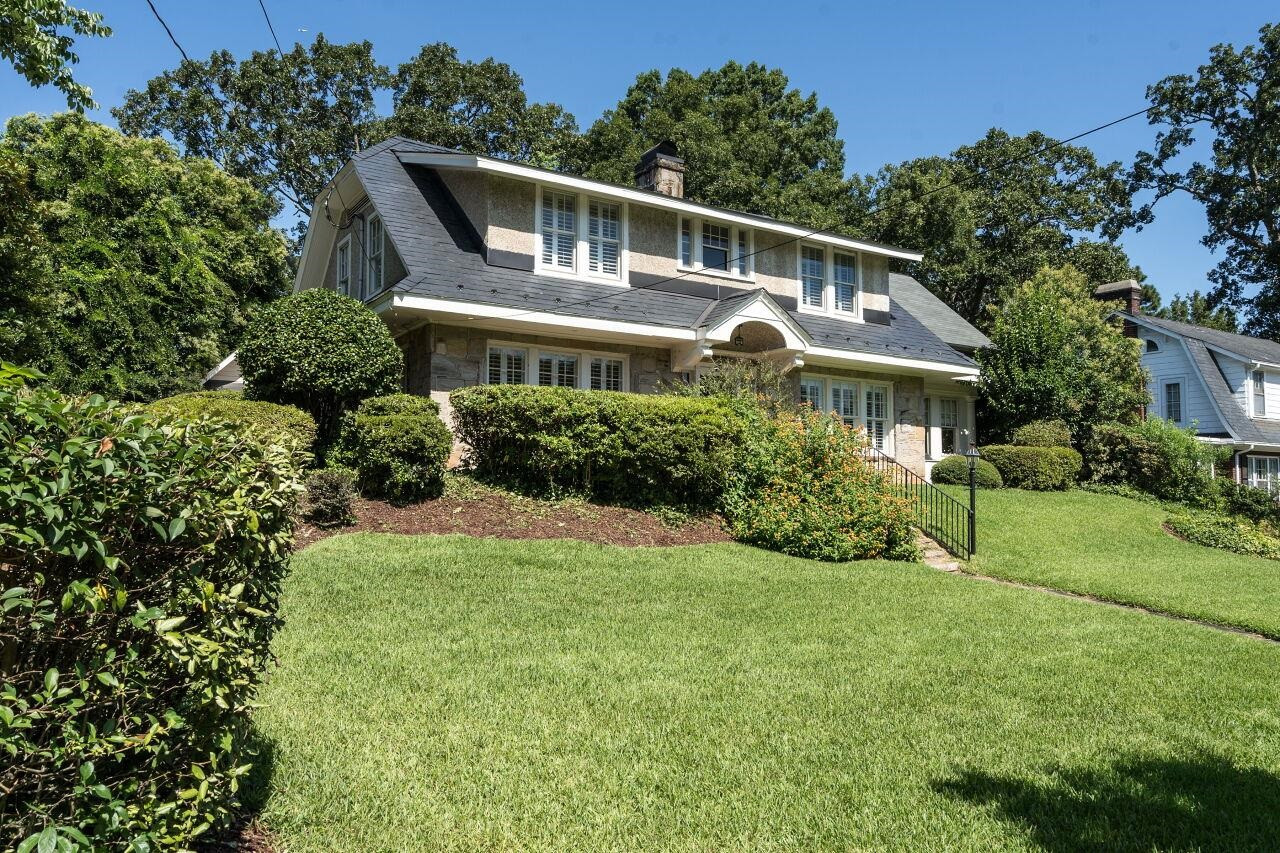 13 Furches Street Raleigh, NC 27607 - Photo 2 of 37 a front view of a house with a yard