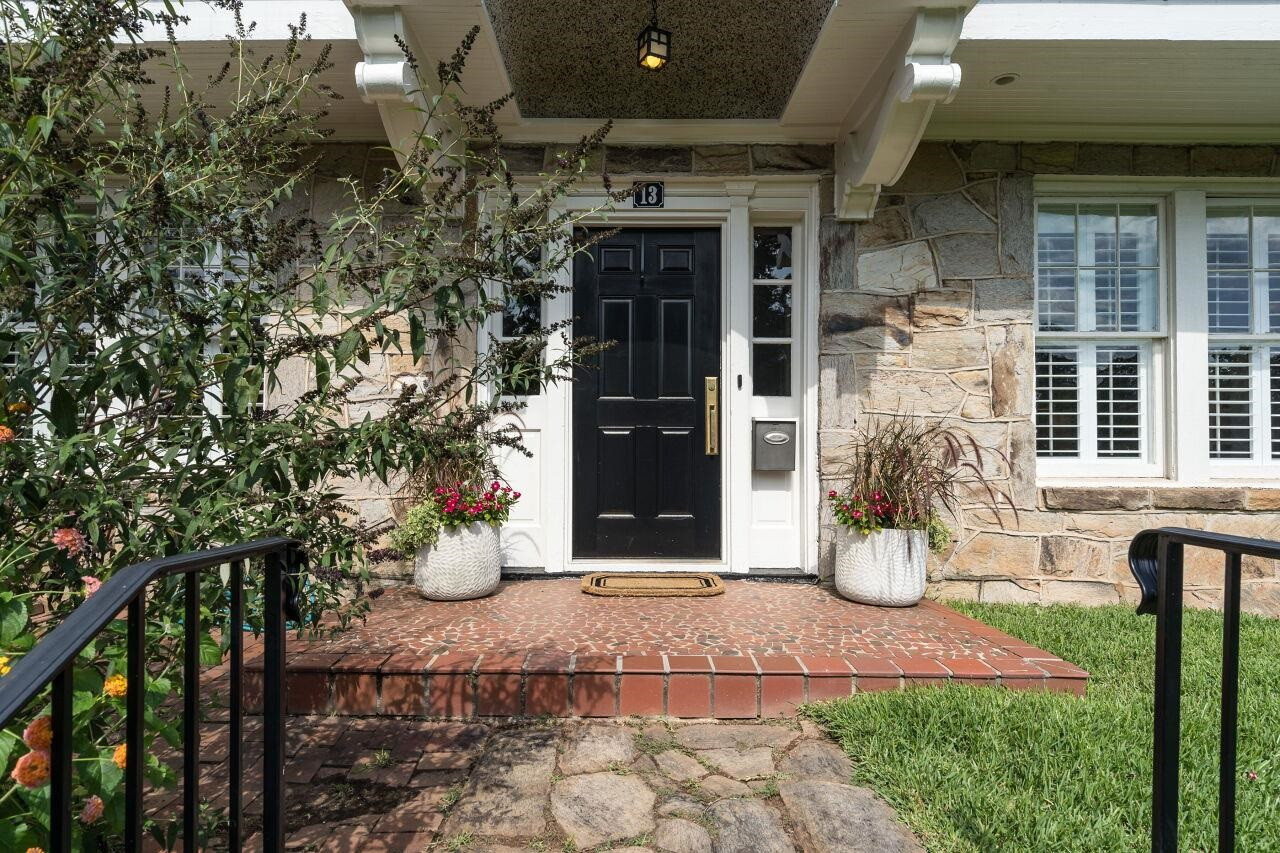 13 Furches Street Raleigh, NC 27607 - Photo 3 of 37 a front view of a house with a yard