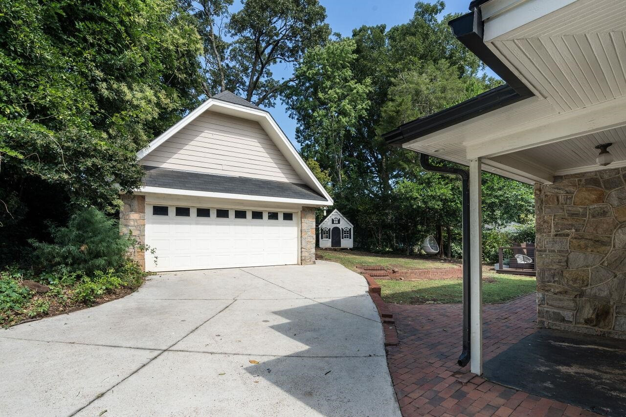 13 Furches Street Raleigh, NC 27607 - Photo 33 of 37 a view of a house with backyard and garden