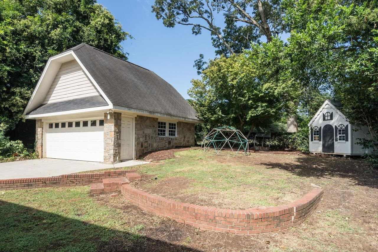 13 Furches Street Raleigh, NC 27607 - Photo 35 of 37 a view of a house with a yard