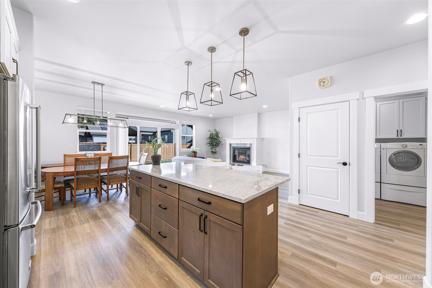 1396 Woods Point Loop Ferndale, WA 98248 - Photo 12 of 32 a large kitchen with kitchen island a lot of counter space