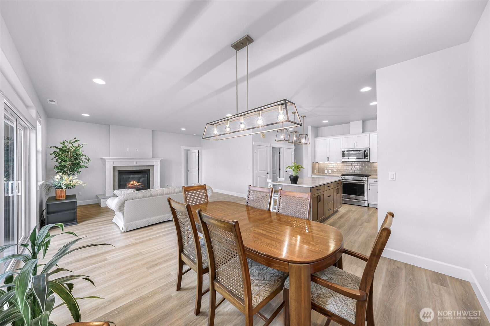 1396 Woods Point Loop Ferndale, WA 98248 - Photo 13 of 32 a view of a dining room with furniture
