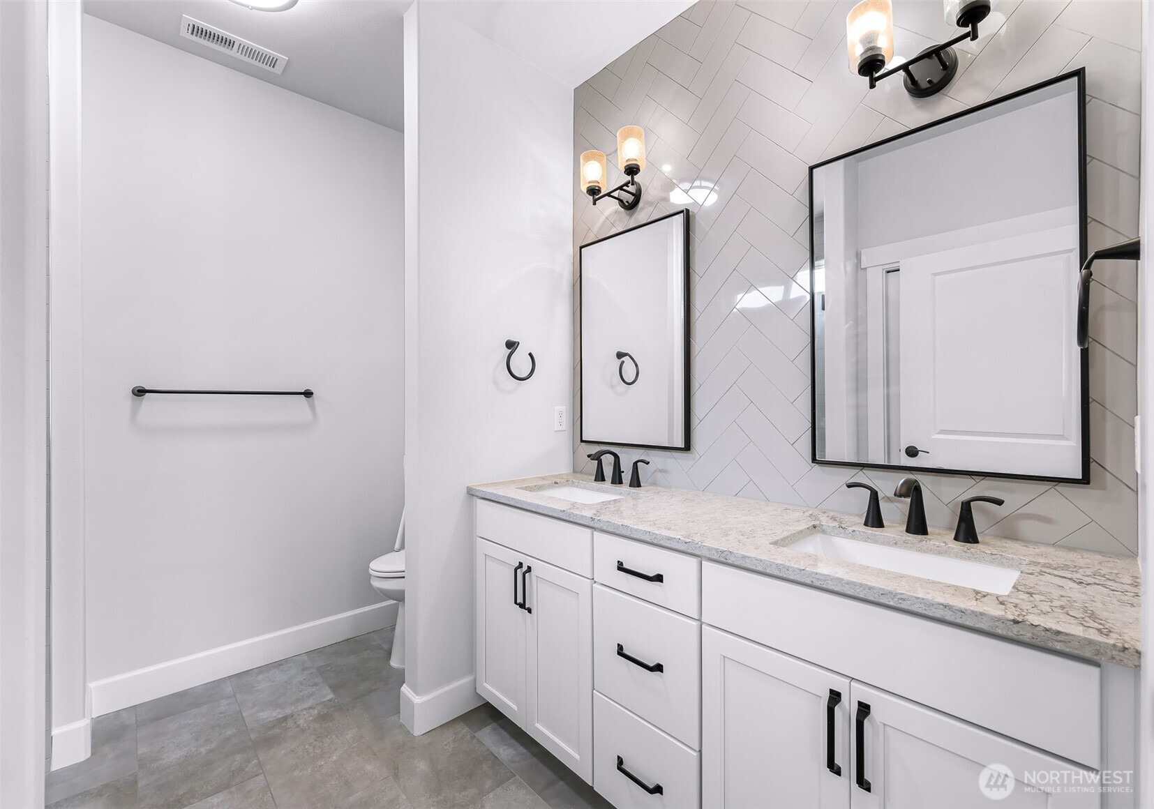 1396 Woods Point Loop Ferndale, WA 98248 - Photo 21 of 32 a bathroom with a granite countertop sink mirror and double