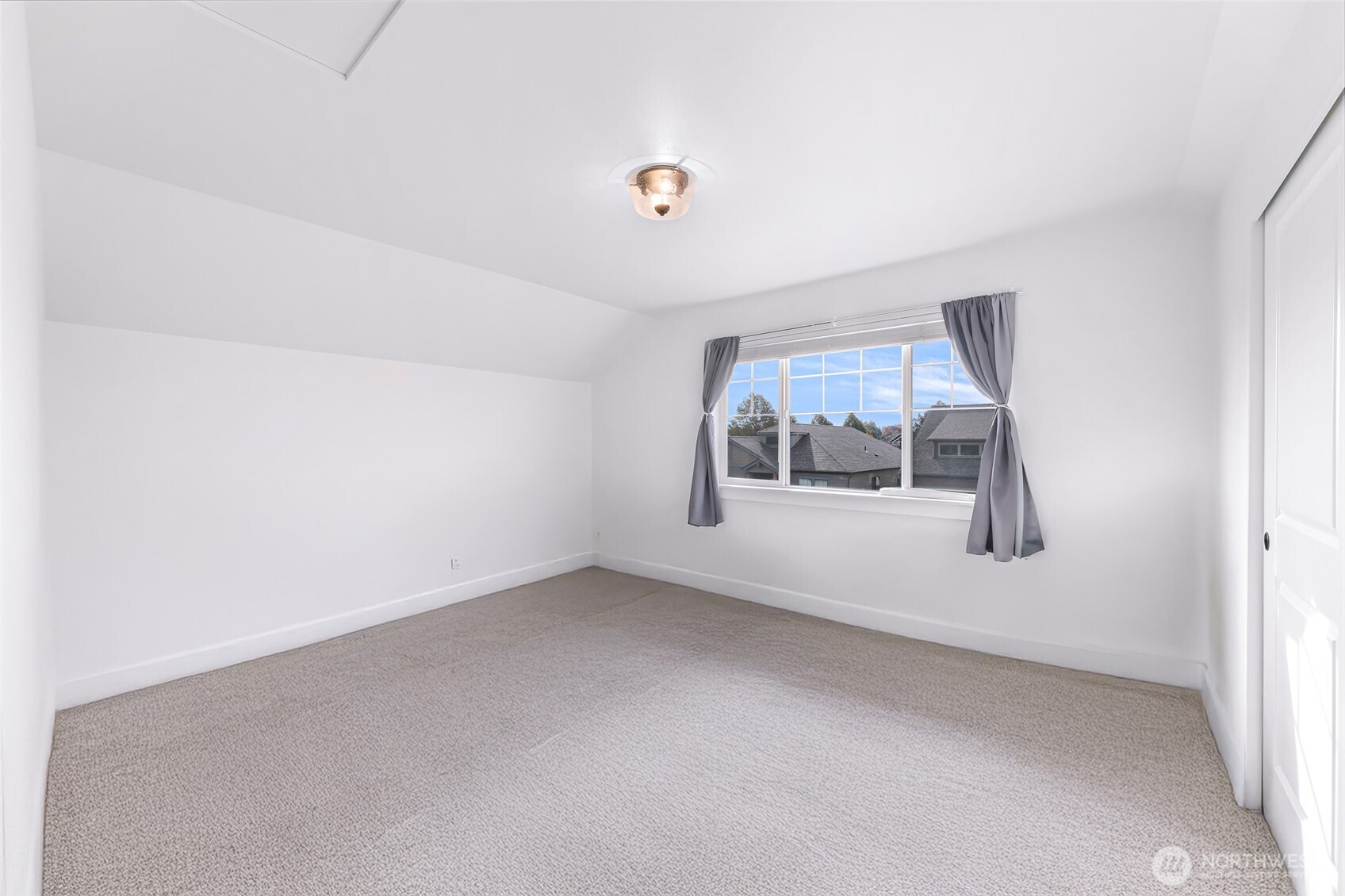 1396 Woods Point Loop Ferndale, WA 98248 - Photo 26 of 32 a view of empty room with window
