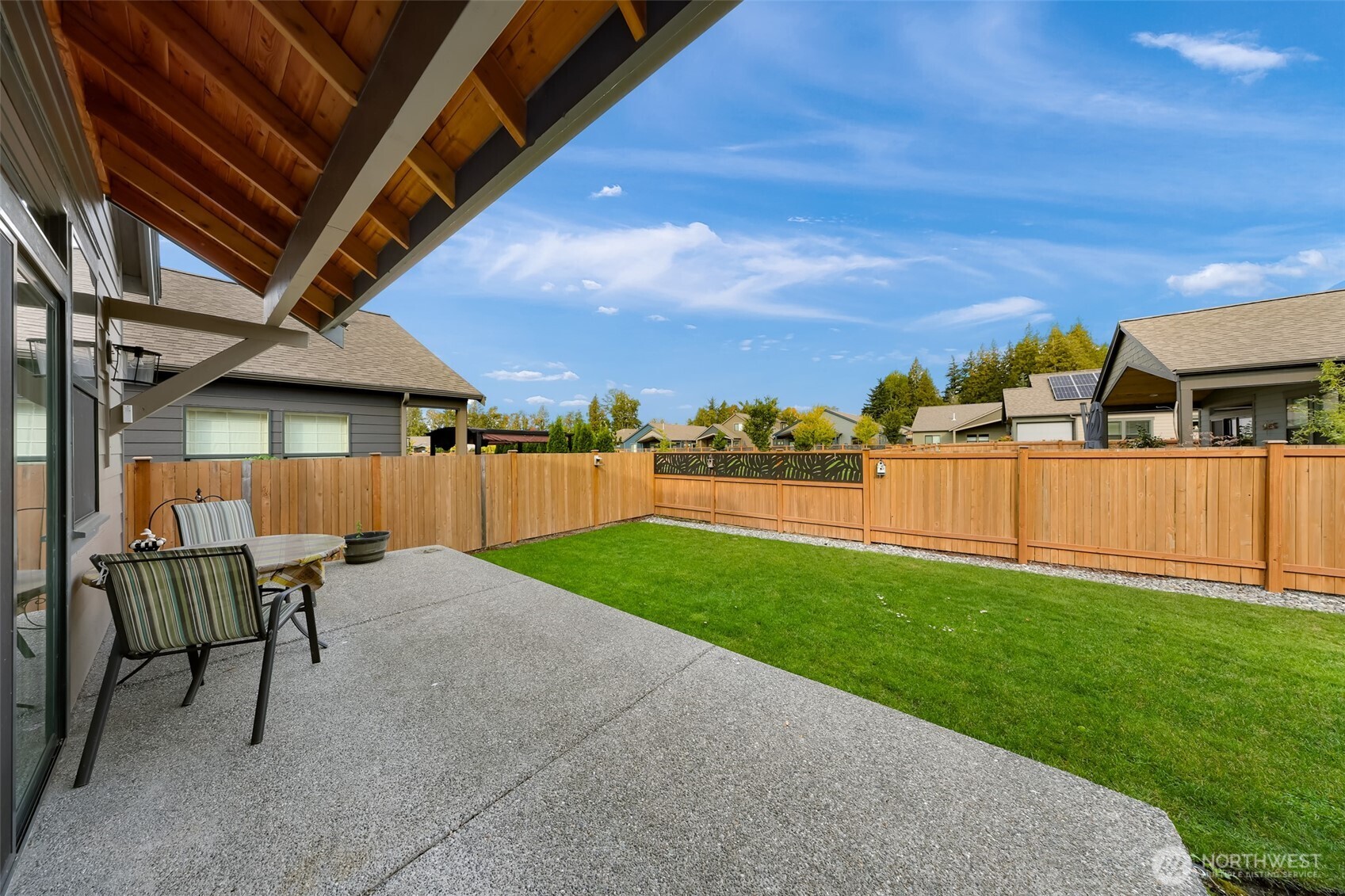 1396 Woods Point Loop Ferndale, WA 98248 - Photo 29 of 32 a view of a backyard with sitting area