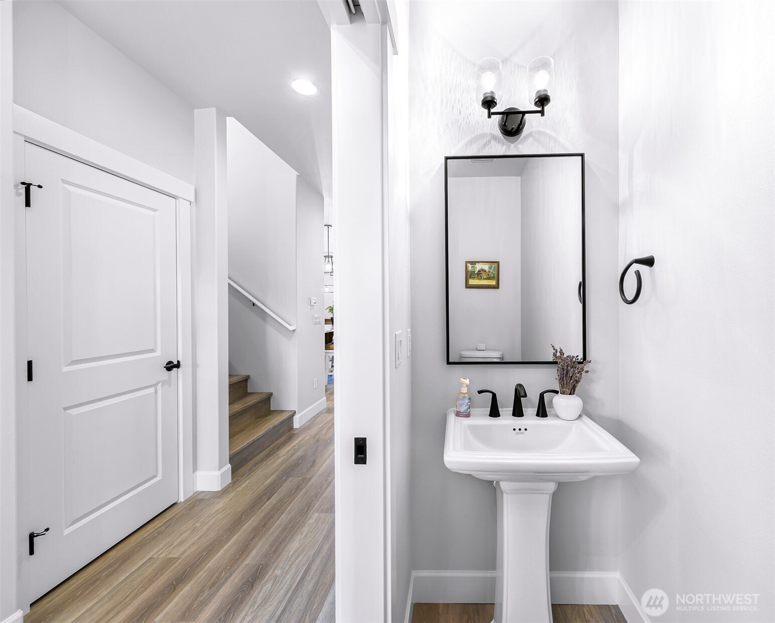 1396 Woods Point Loop Ferndale, WA 98248 - Photo 4 of 32 a bathroom with a sink and mirror