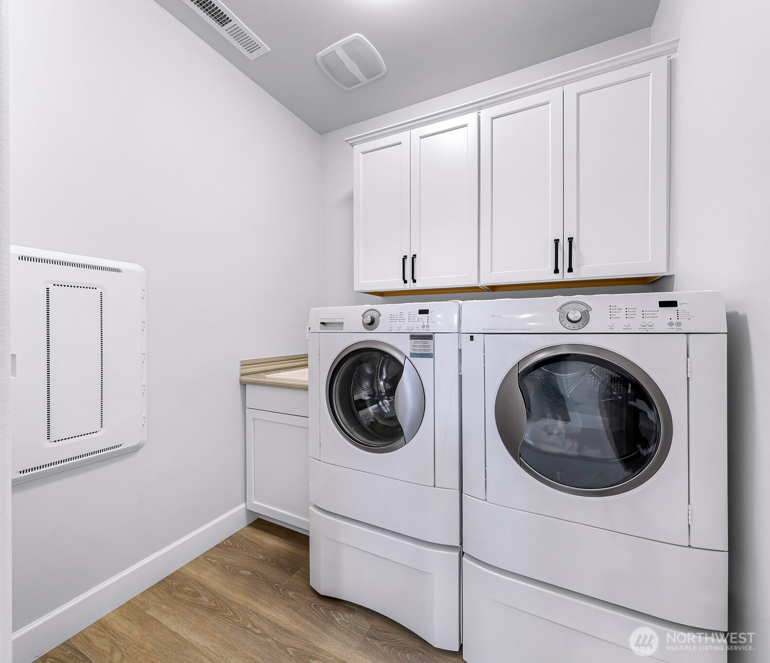 1396 Woods Point Loop Ferndale, WA 98248 - Photo 5 of 32 a utility room with dryer and washer