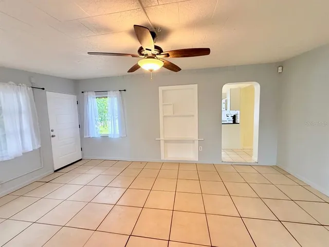 a view of an empty room and window