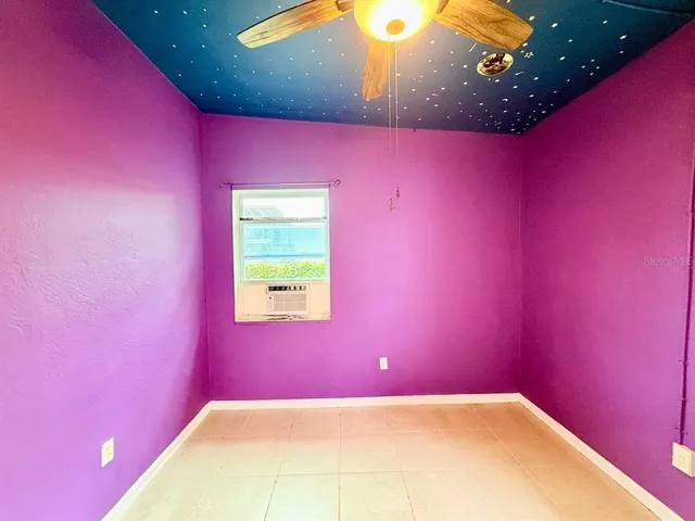 a view of a big room with table and chair