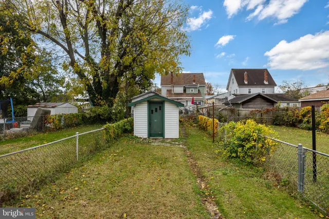 a picture of a bench in front of a door
