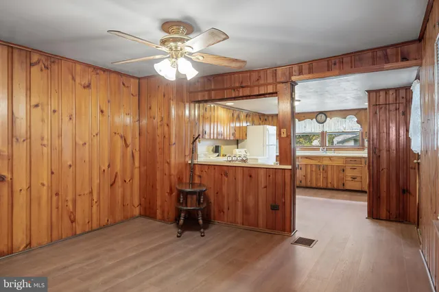 a kitchen with sink cabinets and window