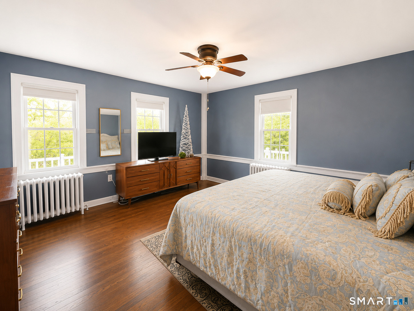 443 Amity Road Bethany, CT 06524 - Photo 18 of 30 a spacious bedroom with a bed and a chandelier