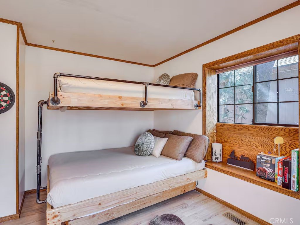 452 Orange Sugarloaf, CA 92386 - Photo 18 of 29 a bedroom with a bed and window